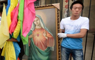Catholics carry a portrait of the Virgin Mary in China’s Hebei Province on May 26, 2013. AFP via Getty Images/CNA.